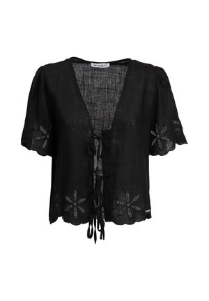 Black short-sleeve blouse with floral cutout patterns on sleeves and hem, front ties, and a textured fabric by Influencer.