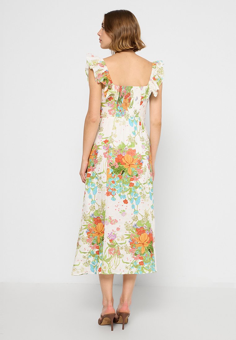 Abito midi a stampa floreale con maniche arricciate, caratterizzato da colori vivaci tra cui arancione e verde, e un dettaglio sul retro smock.
