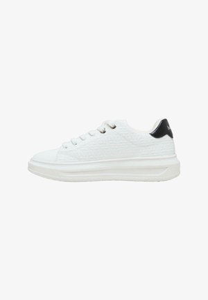 White sneakers with textured design, flat sole, round toe, and black heel accent. Features six eyelets and plain laces.