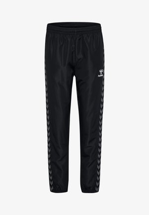 Pantaloni sportivi neri realizzati in tessuto leggero con una finitura testurizzata, caratterizzati da accenti grigi a forma di chevron lungo i lati e una vita elastica.