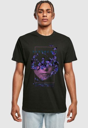 Black cotton t-shirt featuring a graphic design of purple butterflies and a half-visible face with the text “SYNTHESIS EVANESCENCE.”