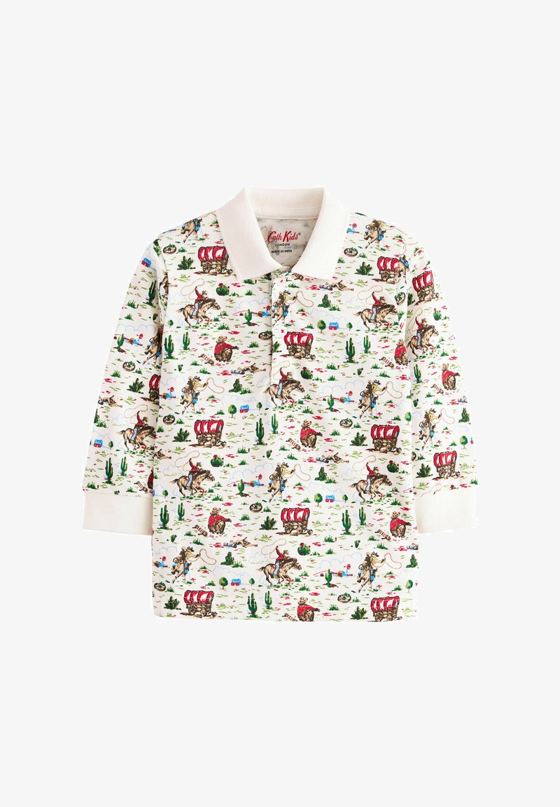 Krémszínű pólóing színes, nyugati témájú mintával, amely cowboyokat, kocsikat, kaktuszokat és virágokat ábrázol; hosszú ujjakkal, mandzsettával.