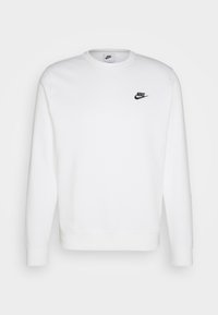 Sudadera blanca de mezcla de algodón, con un cuello redondo, mangas largas y un logo negro de Nike en el pecho. Textura suave.