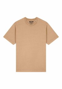 Camiseta de algodón beige con mangas cortas, cuello redondo y corte relajado. Textura suave con mínimos detalles de costura. Etiqueta de la marca en el interior del cuello.