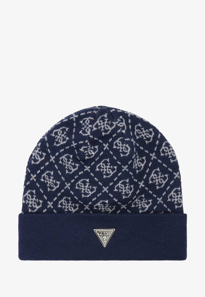 Gorro de punto azul marino con patrones geométricos blancos, con dobladillo, y una etiqueta triangular plateada en la parte frontal. Textura suave y diseño cálido.