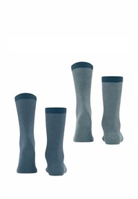 Gestreifte Socken in verschiedenen Blautönen, mit einem gerippten Bündchen und glatter Textur. In Paaren mit kontrastierenden Designs präsentiert.
