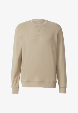 Beige spalva džemperis pagamintas iš minkštos medžiagos, su apvalia iškirpte, ilgomis rankovėmis, įaudžiamais rankogalviais ir subtiliu iškilmu logotipu priekyje.