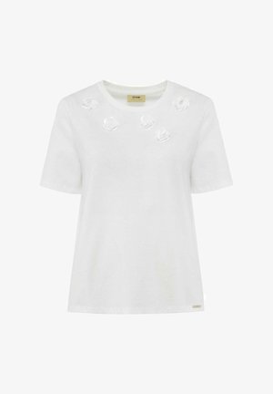 Biała bawełniana koszulka z krótkim rękawem, z trójwymiarowymi białymi aplikacjami kwiatowymi z przodu i małą metką z logo u dołu.