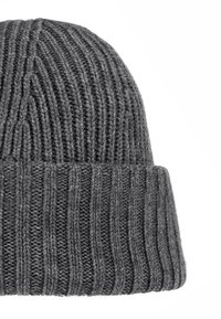 Gray knitted woolen beanie with vertical ribbing and a folded brim, displayed on a white background.