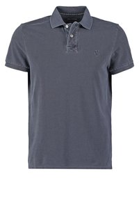 Polo bleu marine en coton, avec une patte de boutonnage à trois boutons, des manches courtes et un petit logo brodé sur la poitrine.