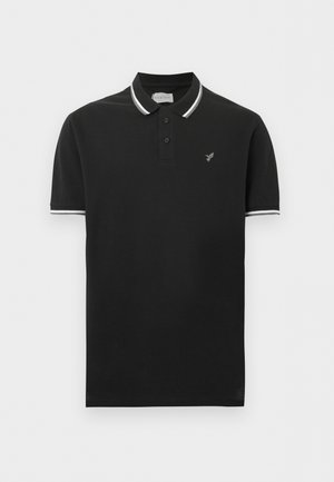 Zwart poloshirt met korte mouwen, wit contrastbies op de kraag en mouwen, een knopenlijst met twee knopen, en een klein grijs vogel logo op de linkerborst.