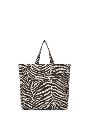 Borsa tote a righe zebrate in bianco e nero realizzata in tessuto resistente, con due manici corti e una parte superiore ampia e aperta per un facile accesso.