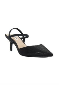 Black pointed-toe slingback pump with textured fabric, thin ankle straps, and a 2-inch kitten heel. Interior is a solid beige color.