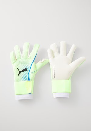 Guanti da portiere verdi con palmo in lattice testurizzato, interno bianco e cinturini elastici per il polso. Presenta un accento blu e un logo nero.