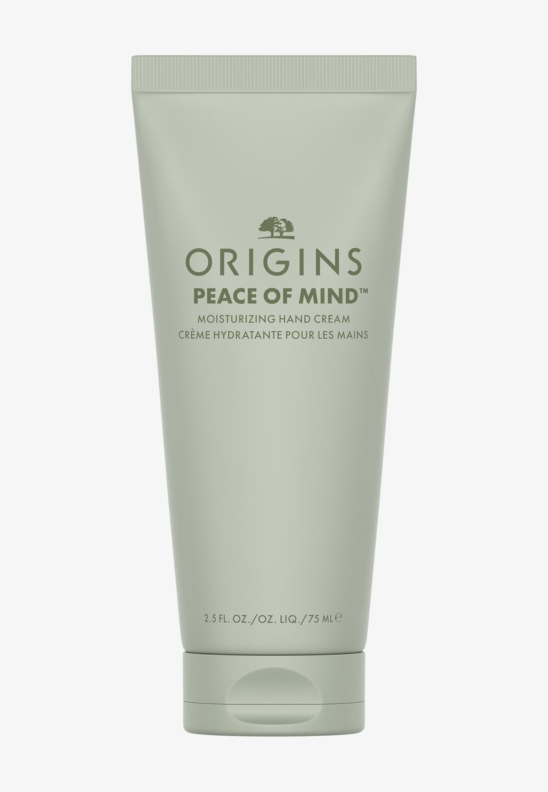 Grønn plasttube med flip-top lokk, merket «Origins Peace of Mind», inneholder 75 milliliter fuktighetsgivende håndkrem.