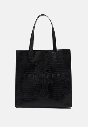 Sort tote-taske med krokodillemønster og lange håndtag, præget med "Ted Baker London" midt på fronten.