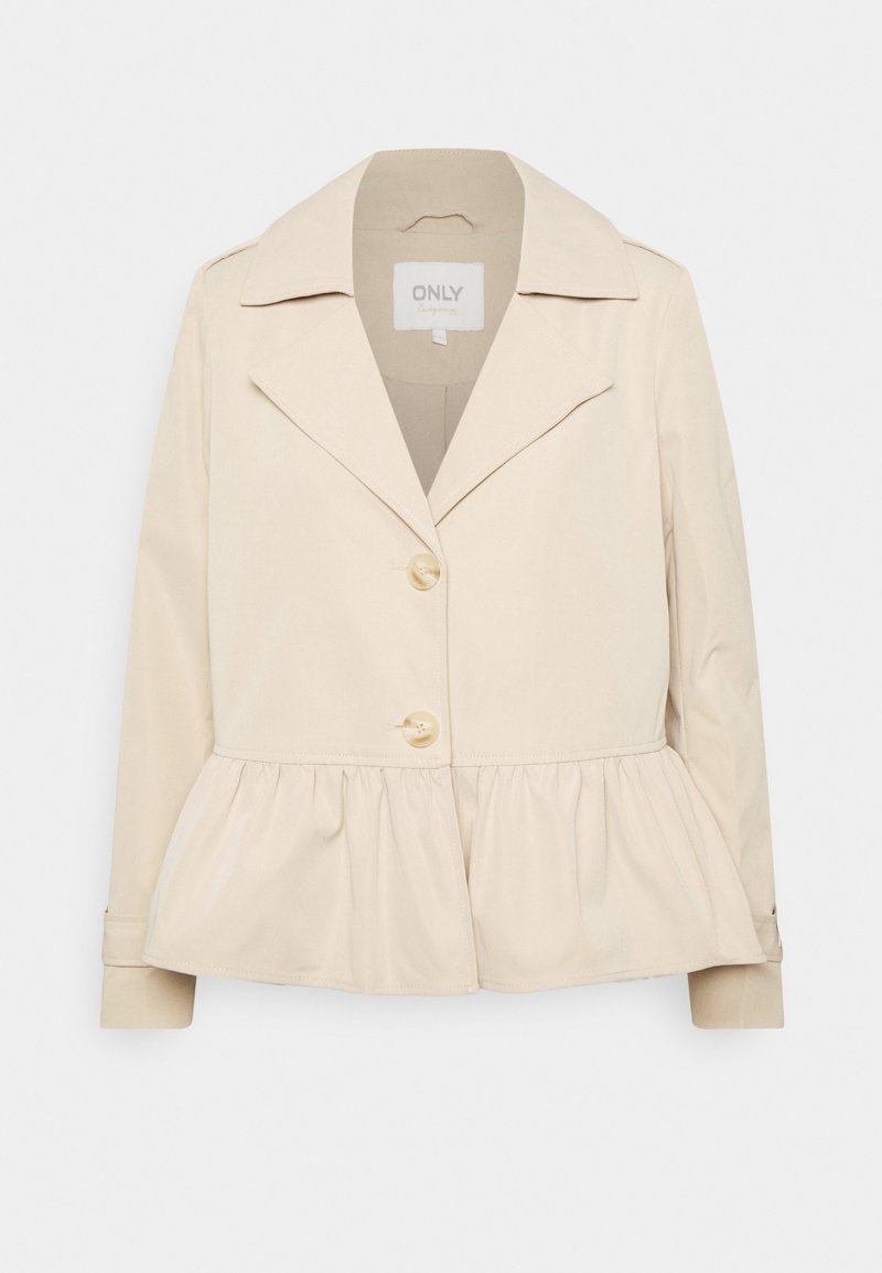 Beżowa kamizelka peplum z gładkiego materiału, z wyciętym kołnierzem, dwoma guzikami oraz długimi rękawami z zapięciem na guziki.