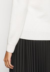 Repeat - Sweter