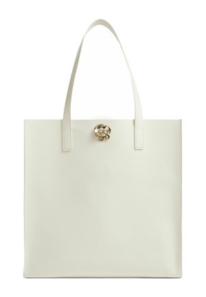 Borsa tote color crema con due manici lunghi e una piccola chiusura dorata a forma di rosa al centro in alto.