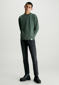 Calvin Klein Jeans AUTHENTIC - Jeans a sigaretta - denim black