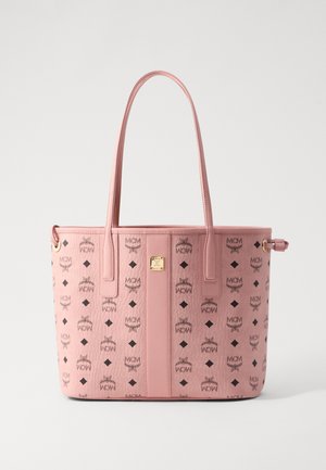 Pink tote bag made of textured material featuring a logo print and diamond patterns. Includes two shoulder straps and a gold logo accent.