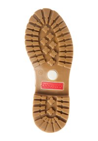 Rubber shoe sole in brown with a tread pattern featuring diamonds and linear grooves; includes a white circular accent and red branding.