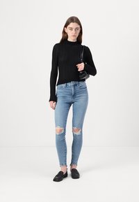 Good American BABY STEP HEM - Jeans Skinny Fit - indigo