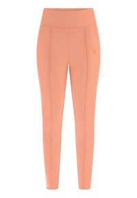 Leggings couleur pêche en tissu extensible lisse, dotés de coutures latérales et d'une large ceinture pour un confort et un ajustement optimal.
