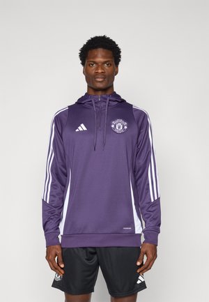 Lilla atletisk hoodie med hvide detaljer, featuring en lynlås foran, hætte og klublogo på brystet. Fremstillet af fugttransporterende stof.