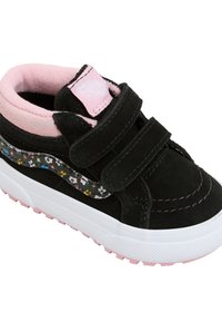 Black suede shoe with pink lining, Velcro straps, floral pattern on the side, white midsole, and pink rubber outsole for grip.