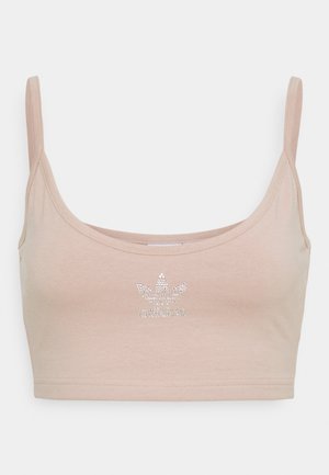 Top corto de color rosa claro con tirantes finos, que presenta un acento de logotipo de rhinestone plateado en la parte delantera, fabricado en una tela suave.