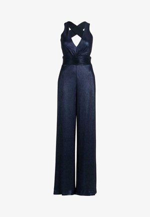 Combinaison sans manches bleu marine avec jambes larges, taille ajustée et détails croisés au niveau de l'encolure sur fond blanc.
