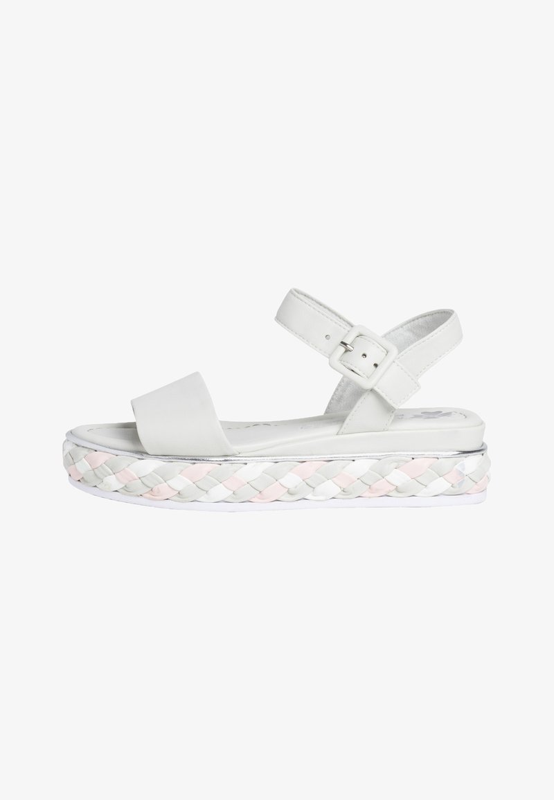 White platform sandals featuring a wide strap, a buckle closure, and a braided multicolored sole with accents of pink, grey, and white.