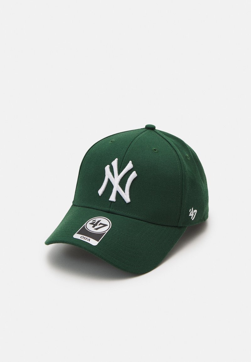 Green baseball cap with a white embroidered NY logo, curved brim, adjustable strap, and fabric tag featuring the brand '47.'