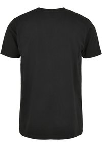 T-shirt noir uni à manches courtes, vu de dos avec un col rond sur fond blanc.