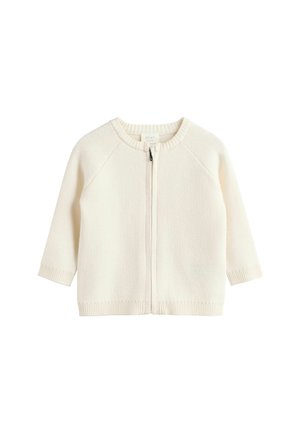Cremfarbener, gestrickter Baby-Cardigan mit rundem Ausschnitt, Reißverschluss und gerippten Bündchen und Saum. Verfügt über Raglanärmel.