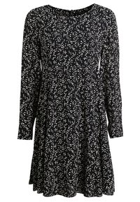 Robe noire à manches longues avec un petit motif blanc en forme de feuilles et un col rond.