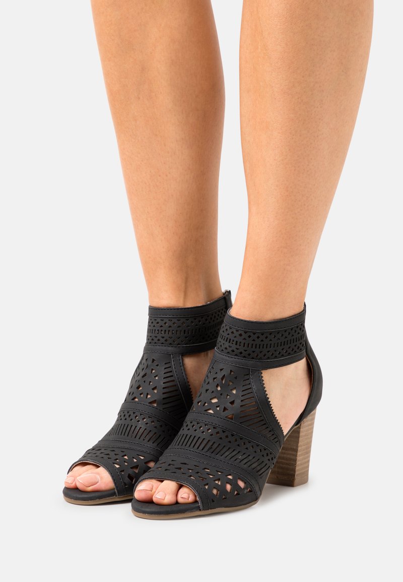 XTI Ankle cuff sandals black Zalando.ie