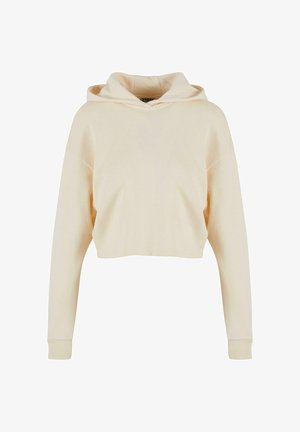 Beskuren huvtröja i ljusbeige bomull. Har långa ärmar, en känguruficka och ribbade ärmslut. Enkelt Design, inga mönster.