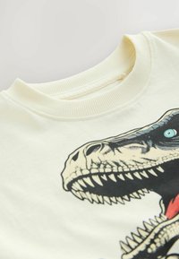 Next SET - Pyžamová sada - white blue dinosaur