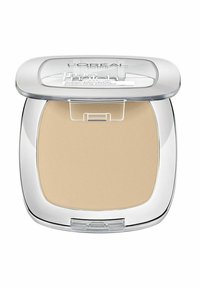 L'Oréal True Match puderkompakt med ett genomskinligt lock. Har en slät, beige puder yta. Innehåller avrundad förpackning med silverkanter.