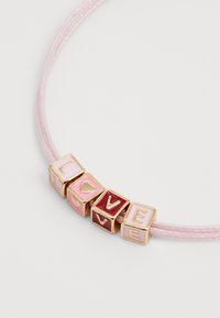 Beaded bracelet featuring pink and red lettered blocks spelling "LOVE" on a pink cord. Blocks have gold accents and glossy finish.