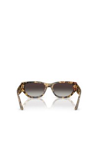 Gafas de sol de carey con montura rectangular, lentes con degradado y brazos texturizados; presentan una coloración audaz y un diseño sobrio.