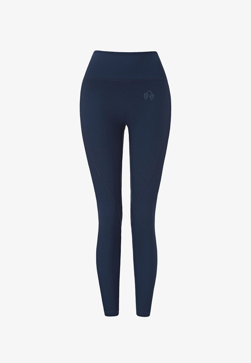 Marineblauwe leggings met een hoge tailleband, voorzien van een gladde textuur en subtiele contrasterende stiksels, ontworpen voor flexibiliteit en comfort.