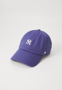 Purple baseball cap with a curved visor, featuring a white embroidered logo on the front and ventilation eyelets on the top.