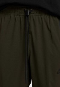 PANT - Pantaloni sportivi - sequoia black