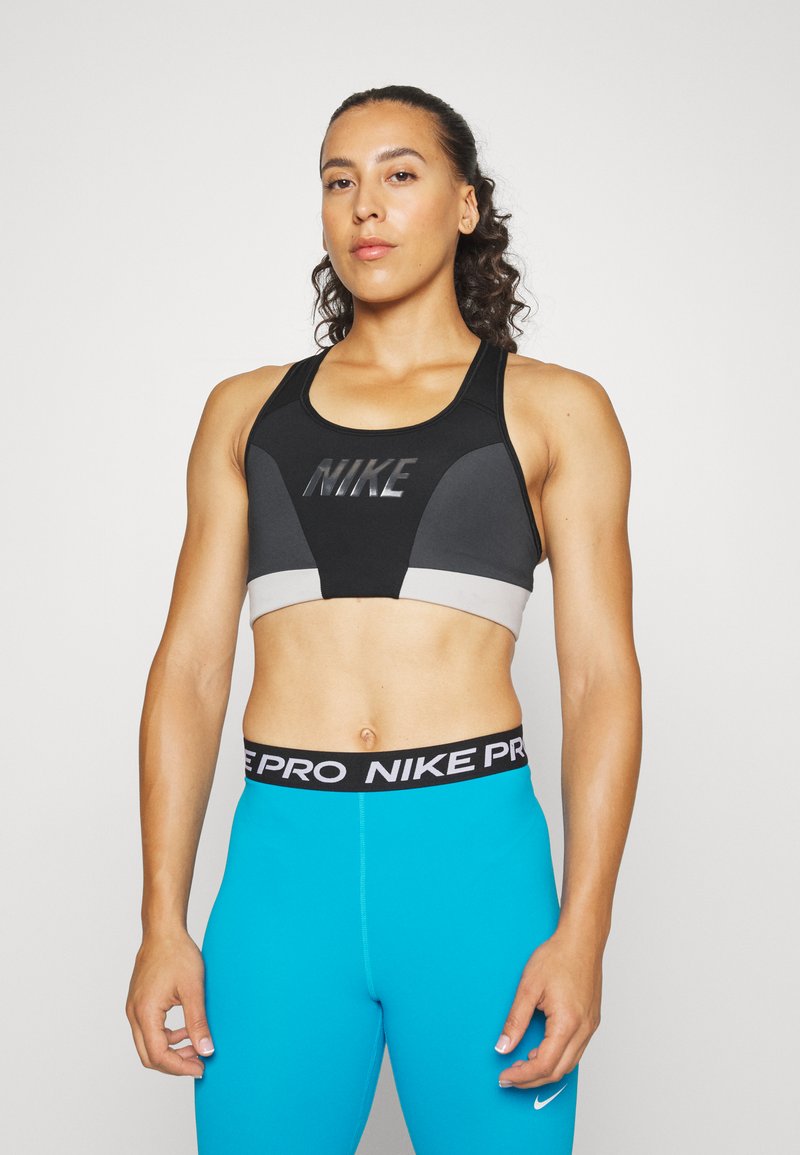 Nike Performance LOGO BRA Medium support sports bra black/dark smoke grey/light iron ore