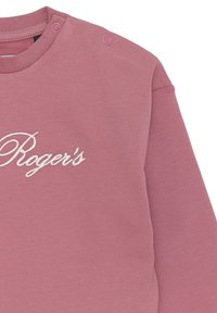 Felpa rosa con ricamo "Roger's", dotata di scollatura rotonda, maniche lunghe e dettagli con bottoni sulla spalla. Tessuto liscio.