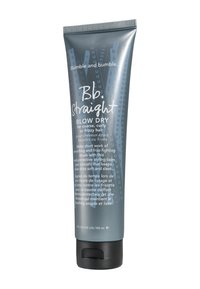 Grå plasttub med ett svart fliplock, prydd med vit och blå text. Innehåller 150 ml värmeskyddande stylingbalsam för frizzigt hår.