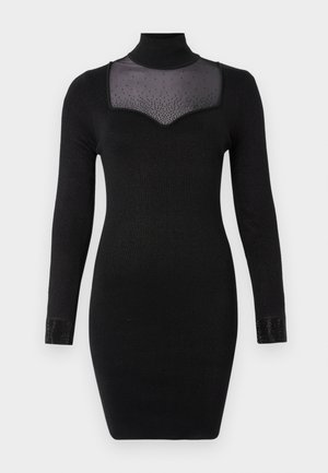 Abito nero a maniche lunghe con collo alto finto, caratterizzato da una scollatura trasparente e dettagli impreziositi sui polsini. Tessuto liscio ed elasticizzato.